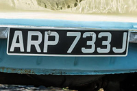Identify the letters and numbers in this image