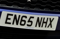 Identify the letters and numbers in this image