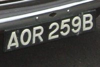 Identify the letters and numbers in this image