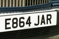 Identify the letters and numbers in this image