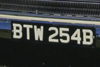 Identify the letters and numbers in this image