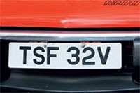 Identify the letters and numbers in this image