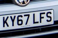 Identify the letters and numbers in this image