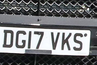 Identify the letters and numbers in this image
