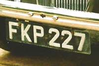 Identify the letters and numbers in this image
