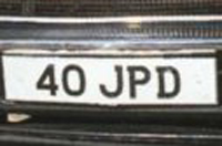 Identify the letters and numbers in this image
