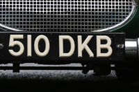 Identify the letters and numbers in this image