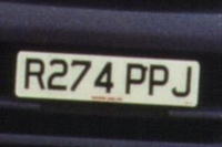 Identify the letters and numbers in this image