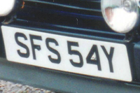 Identify the letters and numbers in this image