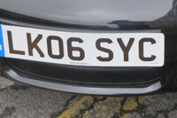 Identify the letters and numbers in this image