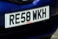 Identify the letters and numbers in this image