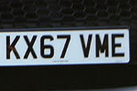 Identify the letters and numbers in this image