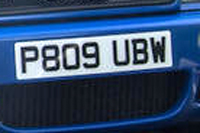 Identify the letters and numbers in this image