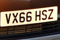 Identify the letters and numbers in this image