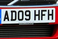 Identify the letters and numbers in this image