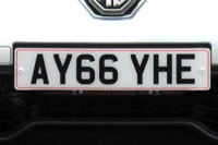 Identify the letters and numbers in this image