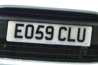Identify the letters and numbers in this image