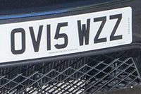 Identify the letters and numbers in this image