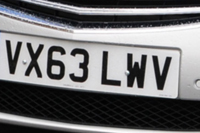 Identify the letters and numbers in this image