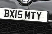 Identify the letters and numbers in this image