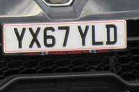 Identify the letters and numbers in this image
