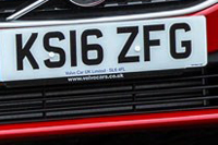 Identify the letters and numbers in this image