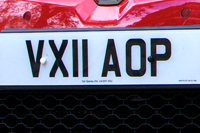 Identify the letters and numbers in this image
