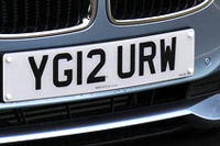 Identify the letters and numbers in this image