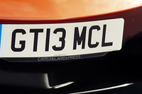 Identify the letters and numbers in this image