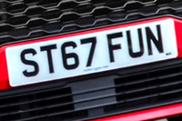 Identify the letters and numbers in this image
