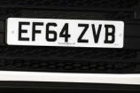 Identify the letters and numbers in this image