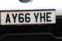 Identify the letters and numbers in this image