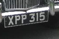 Identify the letters and numbers in this image