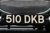 Identify the letters and numbers in this image