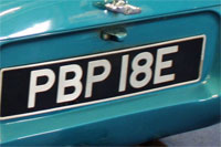 Identify the letters and numbers in this image