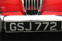 Identify the letters and numbers in this image