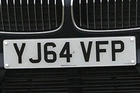 Identify the letters and numbers in this image