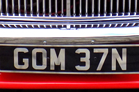Identify the letters and numbers in this image